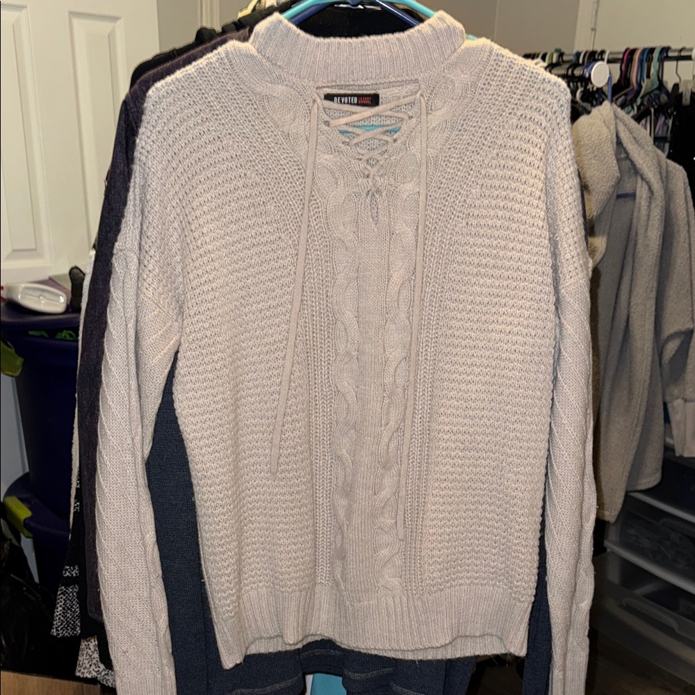 Stylish Beige Cable Knit Sweater with Lace-Up Detail